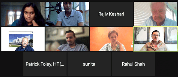 Screenshot of a Zoom meeting with multiple participants discussing cancer disparities and policy reform.