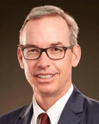 Dr. Andrew Scott Pierson, St. Alphonsus oncologist, promoting rural cancer education through Best of ASCO Boise conference.