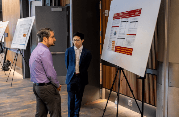Dr. Kevin Chang presenting award-winning geriatric oncology health equity research at SCHD25.