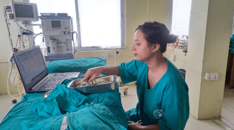 Nurse in the Operation room managing procedure sets at Binaytara Hospital-min.png