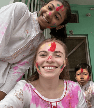 Binaytara intern Haley Fredricks celebrating Holi with local children in Janakpur, Nepal