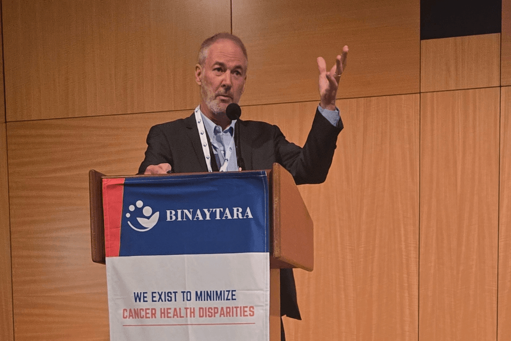 Dr. Eric Vallieres delivering the keynote lecture on surgical advancements in lung cancer care.