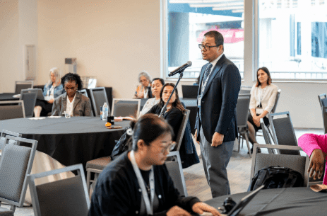 Dr. Joseph Rosales participates in a breakout discussion at SCHD25