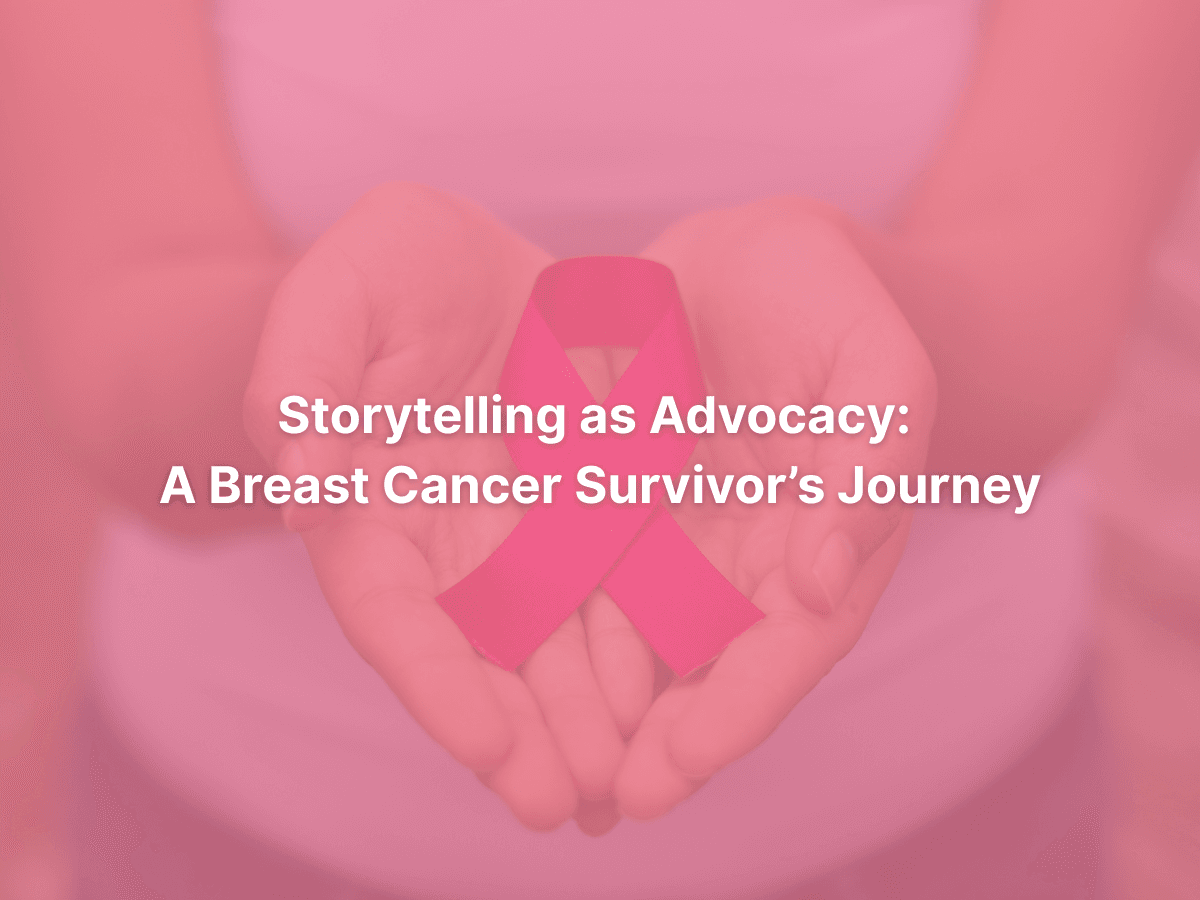 Pink breast cancer ribbon held in hands symbolizing Nikki McCoy’s advocacy journey.
